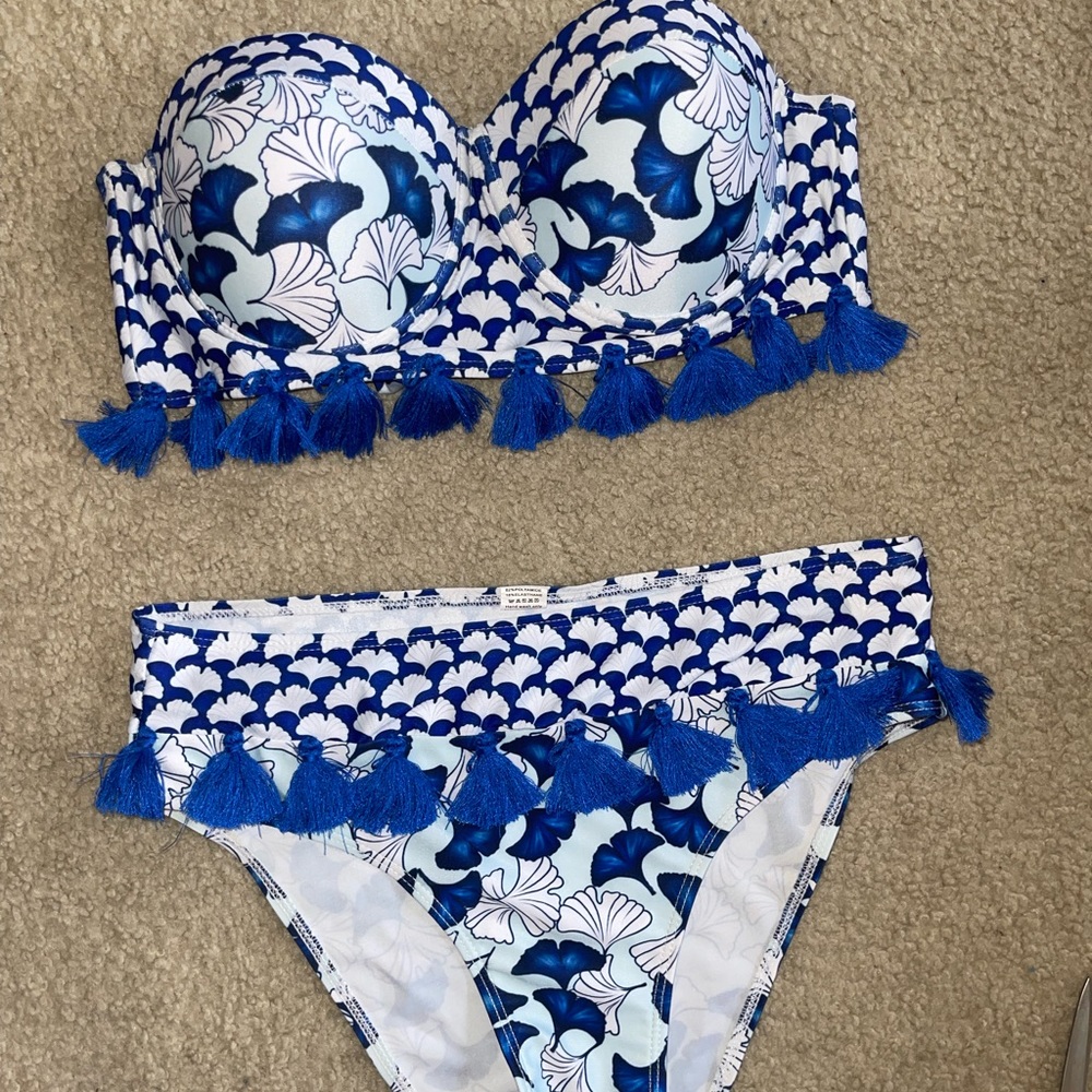 Blue and white two-piece bikini set with tassels